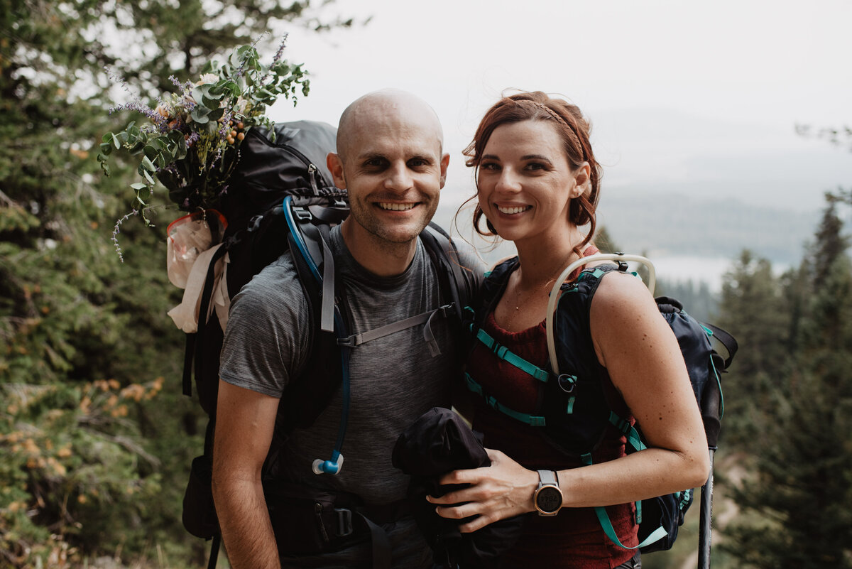 Jackson Hole photographers capture couple smiling at summit