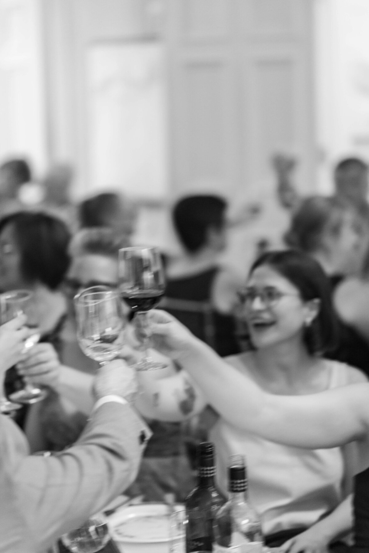 Guests raising glasses at  at Halifax Club wedding in Nova Scotia