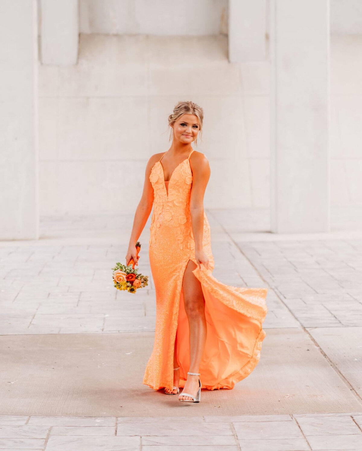 photo of girl in orange prom dress