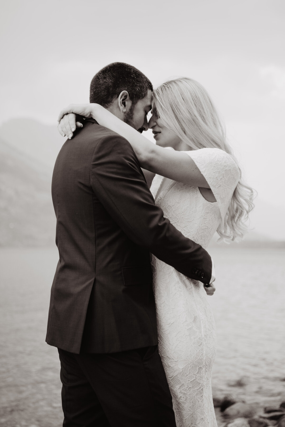 Photographers Jackson Hole capture bride and groom touching noses