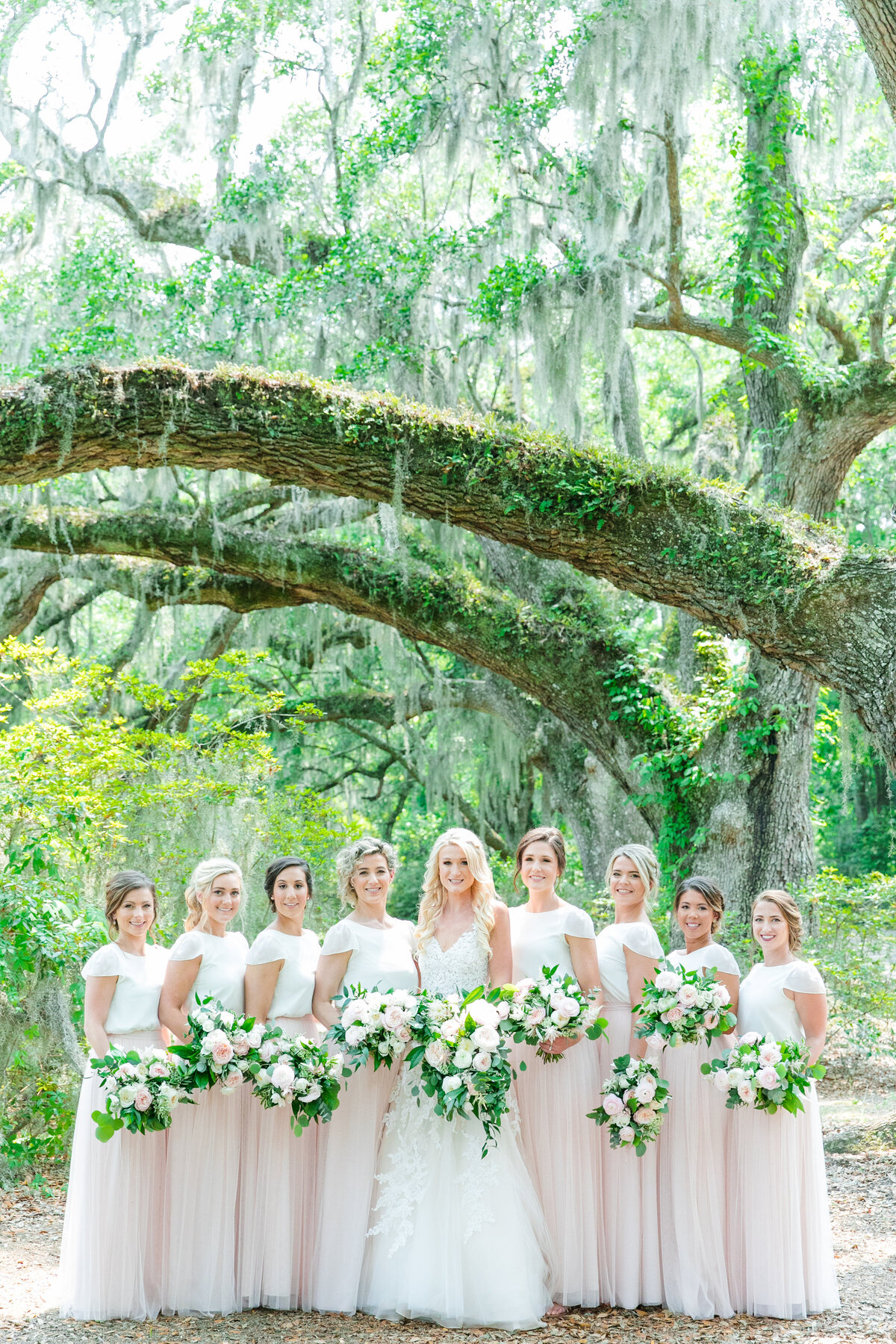 bride + bridesmaids at magnolia plantation wedding
