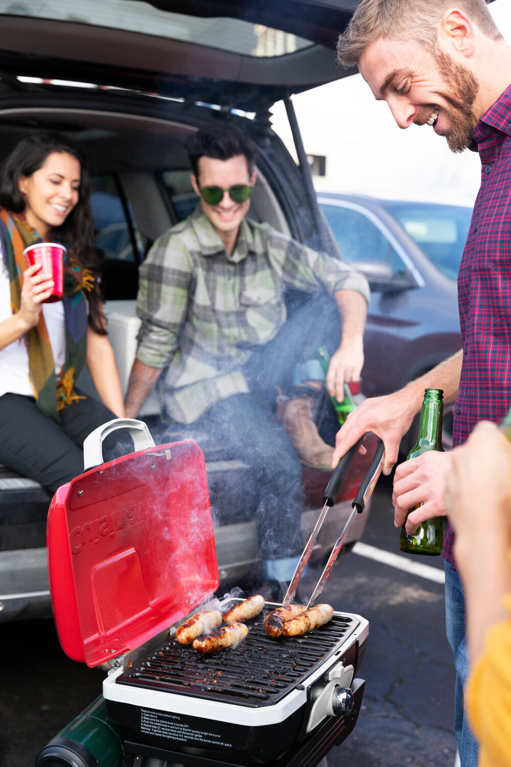 Greer Rivera Commercial Photography Marin CA People tailgating in the back of a vehicle with Cuisinart grill