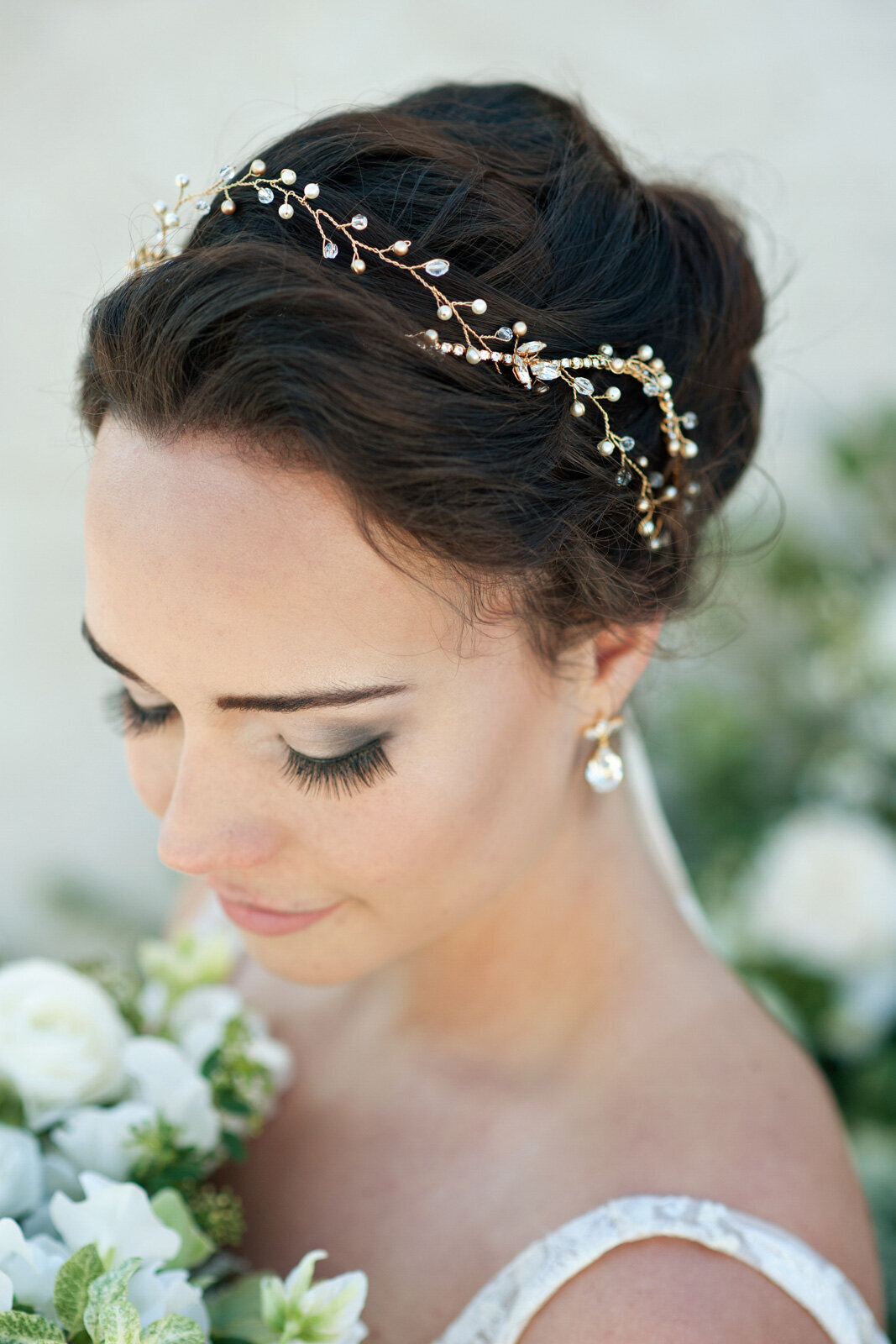 Delicate gold hairpiece with white pearls, by Joanna Bisley Designs, romantic and modern wedding jeweler based in Calgary, Alberta.  Featured on the Brontë Bride Vendor Guide.