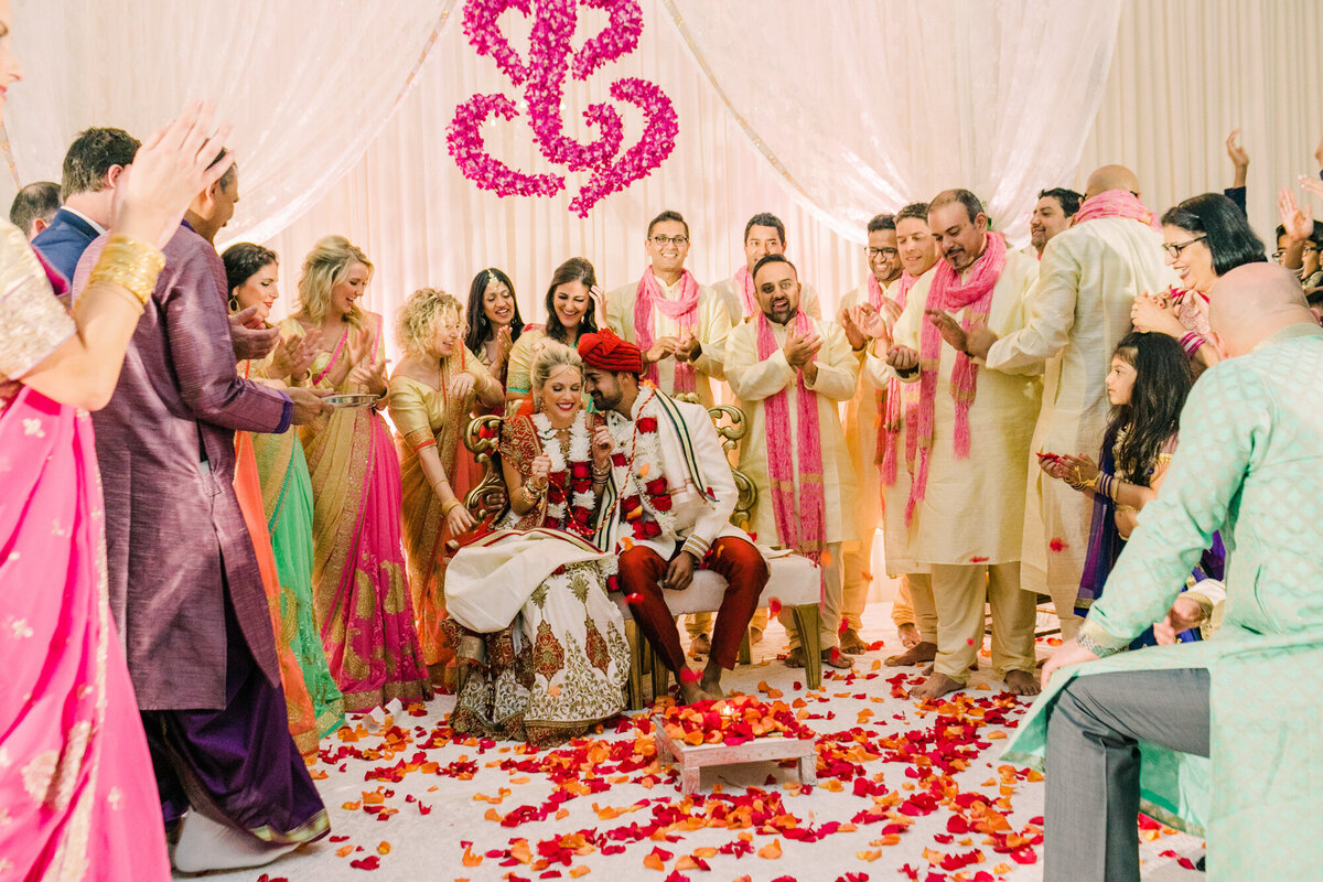 A colorful candid moment during an Indian wedding ceremony