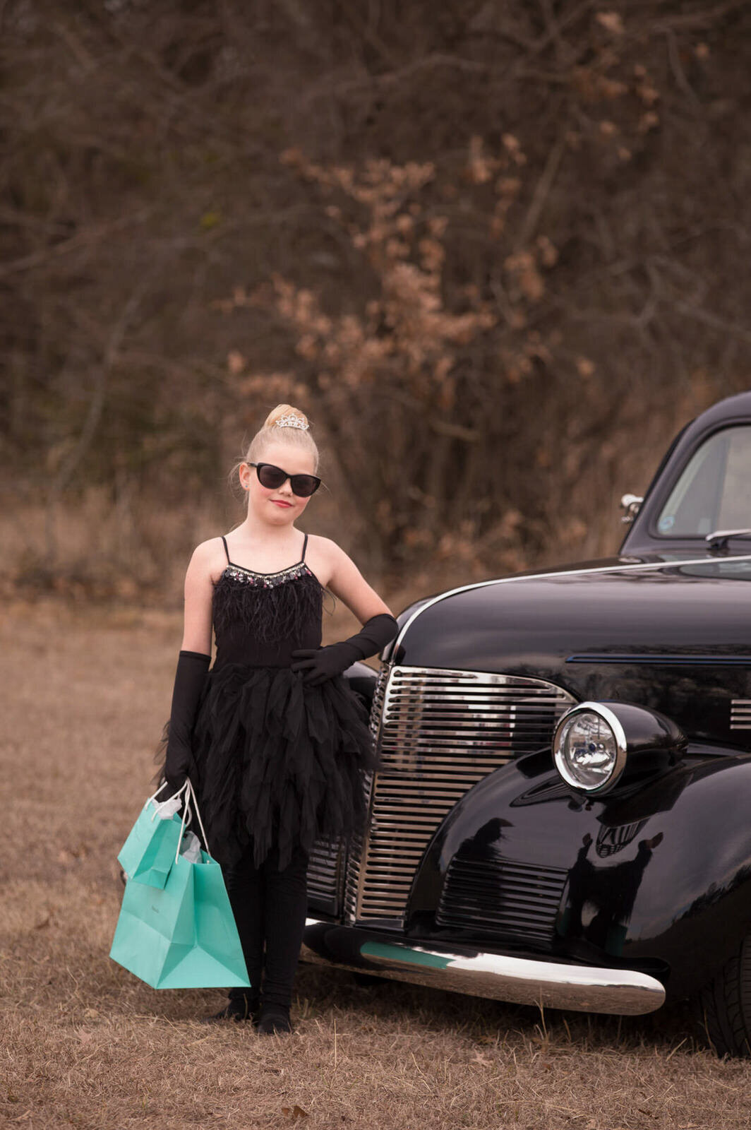 tiffanys-themed-portrait-with-girl-standing-by-vintage -car