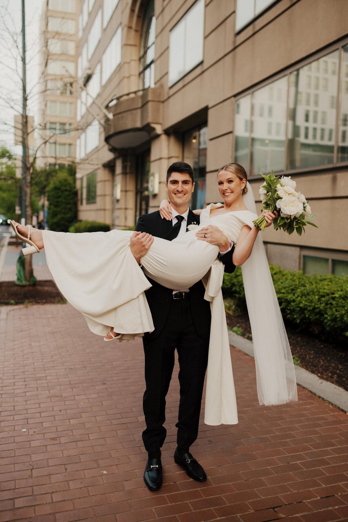 Event-Planning-DC-Wedding-Westin-Georgetown-Hotel-jewelsy-photography-bride-groom-carry