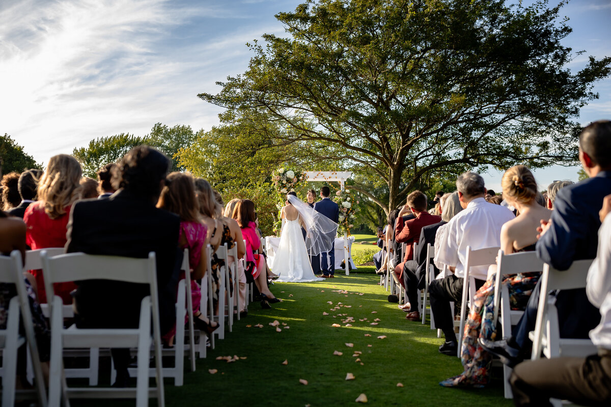 Bride and groom outdoor ceremony at Chevy Chase Country Club