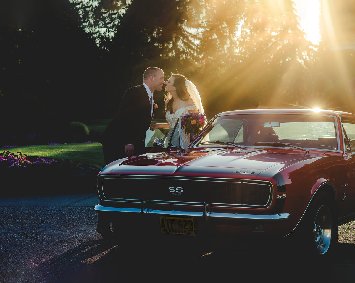wedding couple with old car