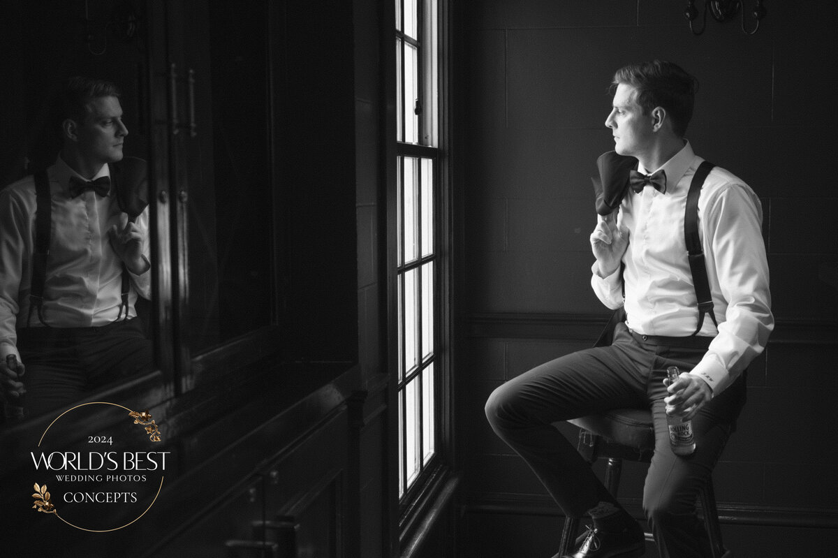 groom-window-light-portrait-with-reflection-photo-by-suess-moments