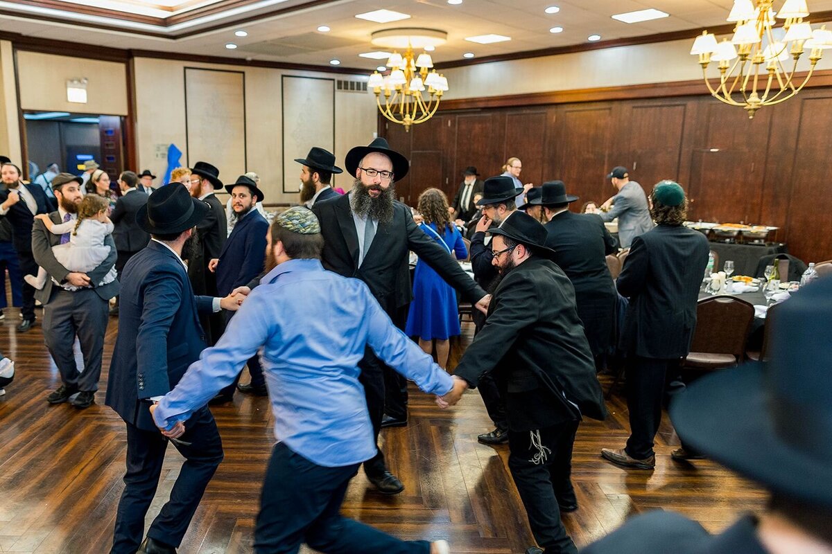 Eliana-Melmed-Photography-Chicago-LosAngeles-Jewish-WeddingPhotographer-CarmiKalman-MensDancing-00124