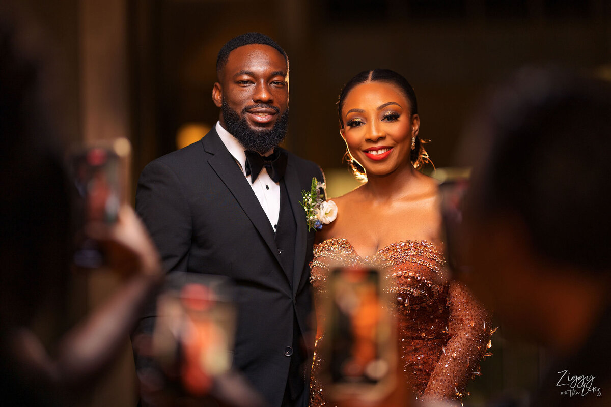 Tomi and Tolu Oruka Events Ziggy on the Lens photographer Wedding event planners Toronto planner African Nigerian Eyitayo Dada Dara Ayoola ottawa convention and event centre pocket flowers Navy blue groom suit ball gown black bride classy  86