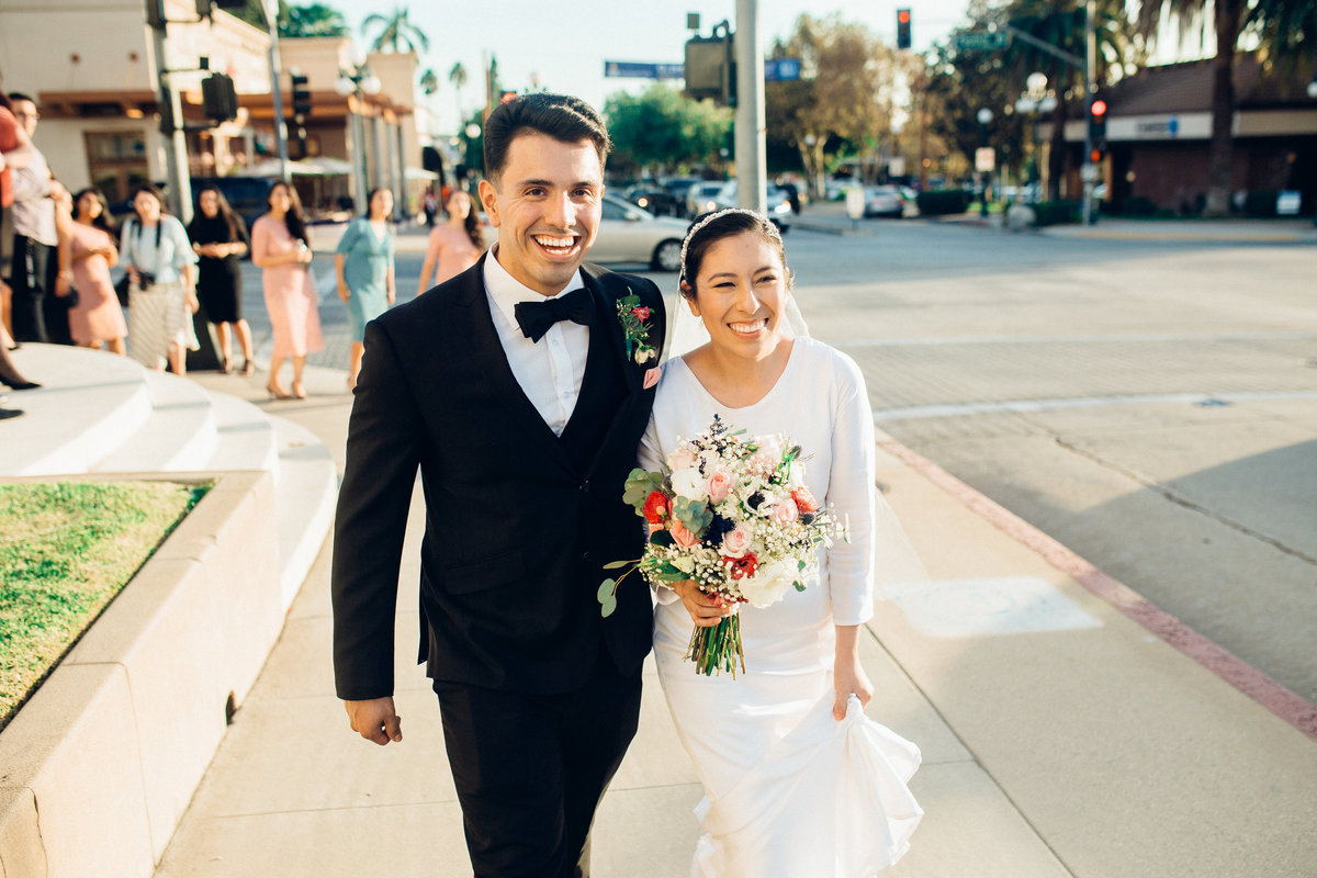 Married Couple Walking Down Street Together Photography