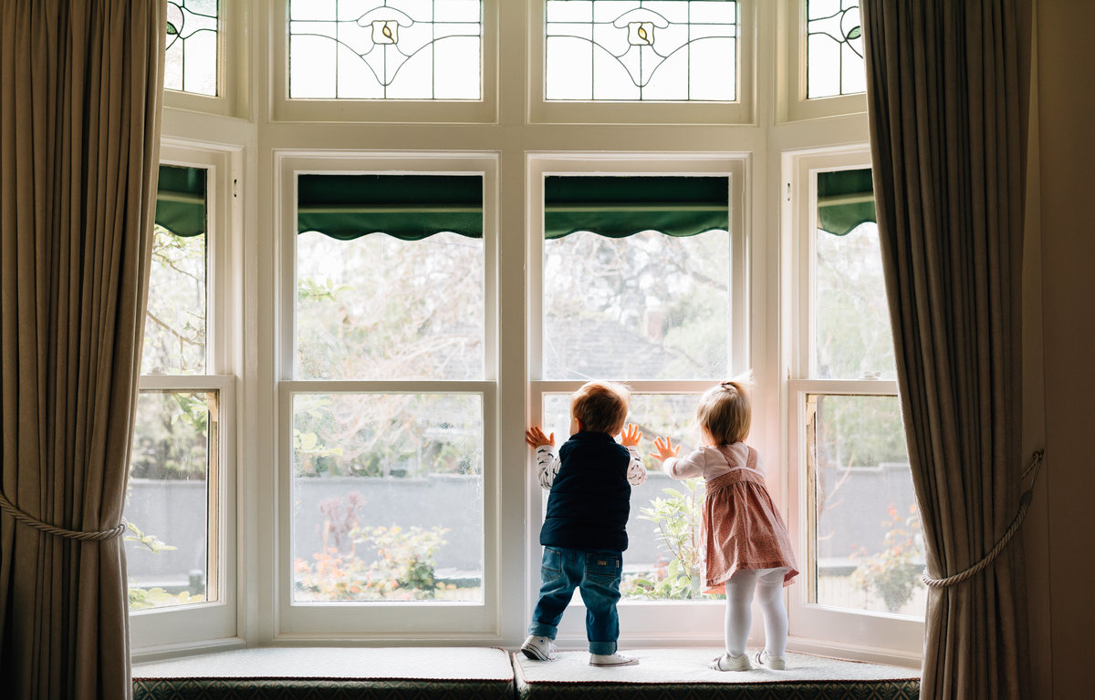 twins in bay window Melbourne lifestyle family photography And So I Don’t Forget Photography