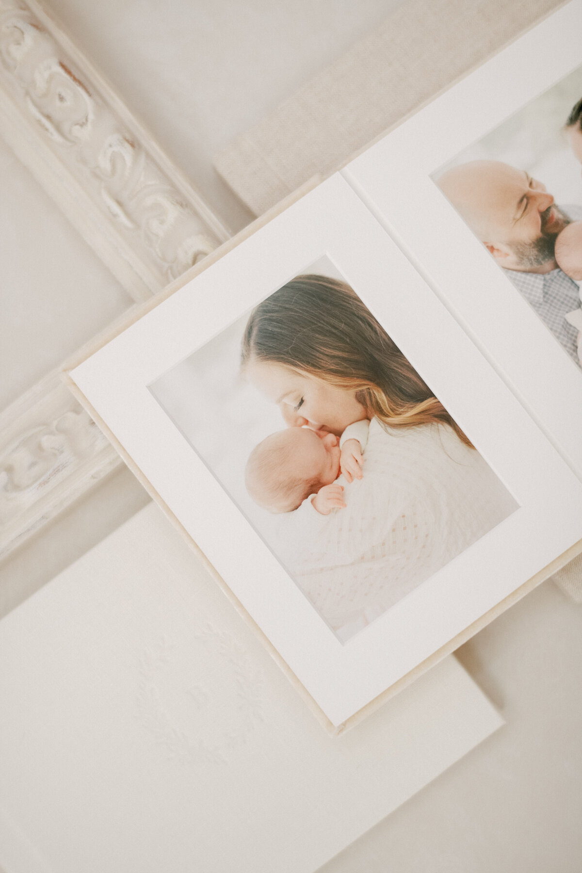Luxury newborn albums displayed and photographed by Raleigh newborn photographer A.J. Dunlap Photography