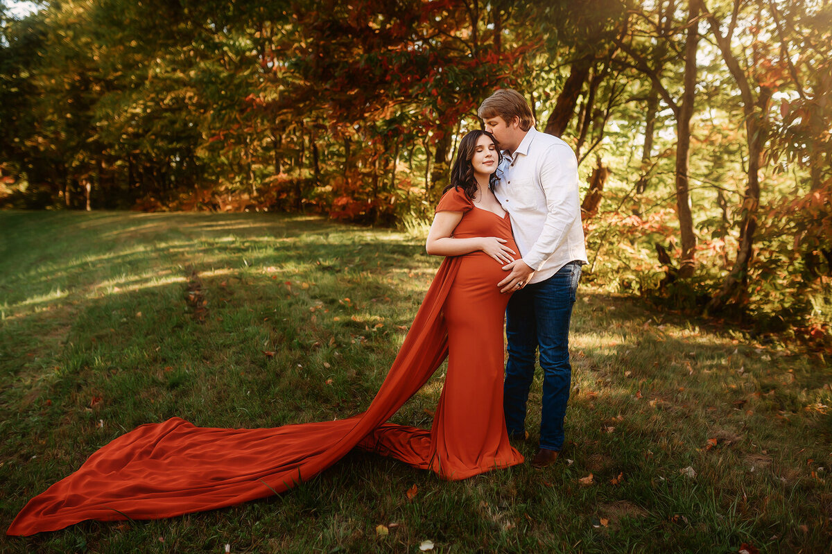 Expectant parents pose for Maternity Portraits in Asheville, NC.