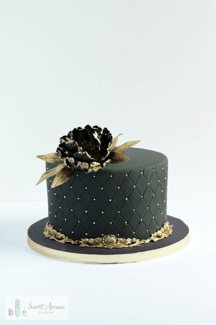 black and gold birthday cake