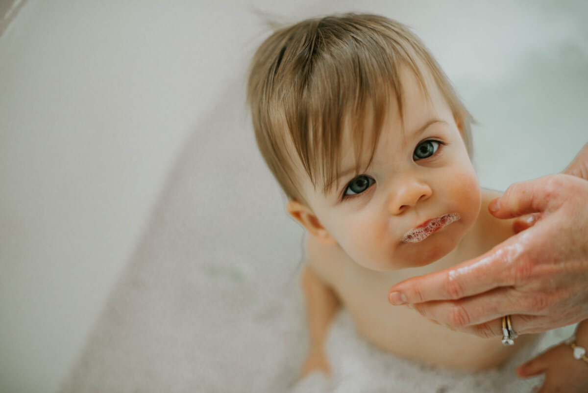 Indoor Motherhood baby bath First Birthday Photography