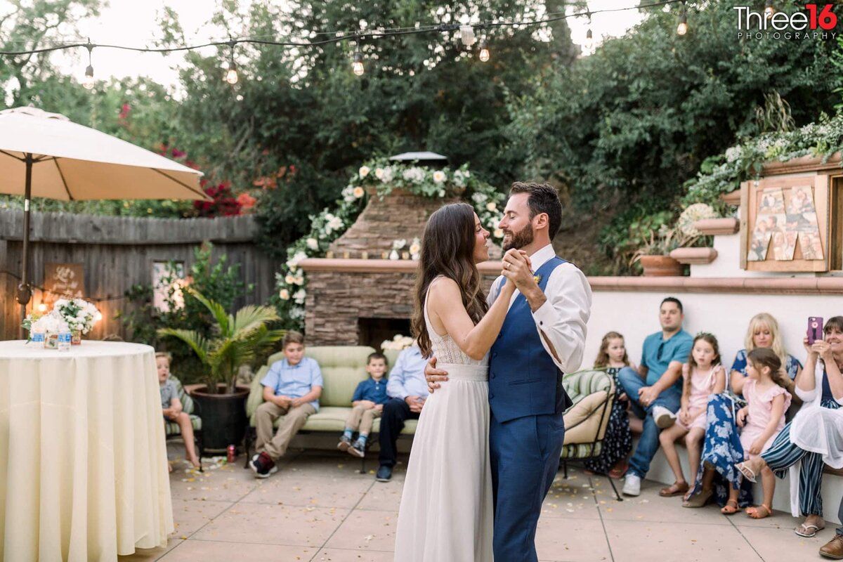 First dance for Bride and Groom in an outdoor venue in a backyard of a relative