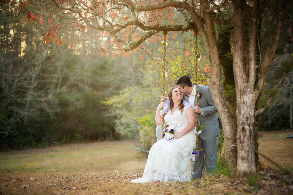 bride_and_groom_on_swing_blue_ridge_ga_beautiful_unique_wedding_photography_