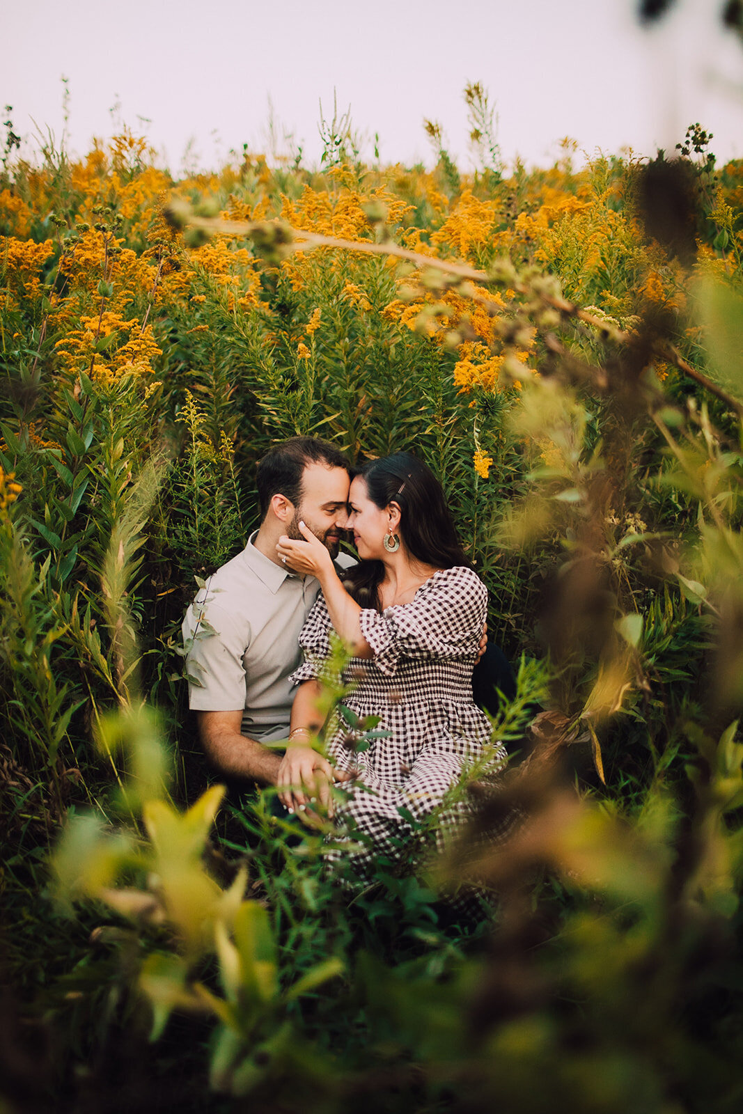 Couple cuddles close at Picnic Point engagement session