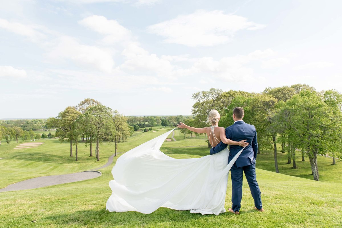 Bride and groom at the golf course of Giorgio's Baiting Hollow