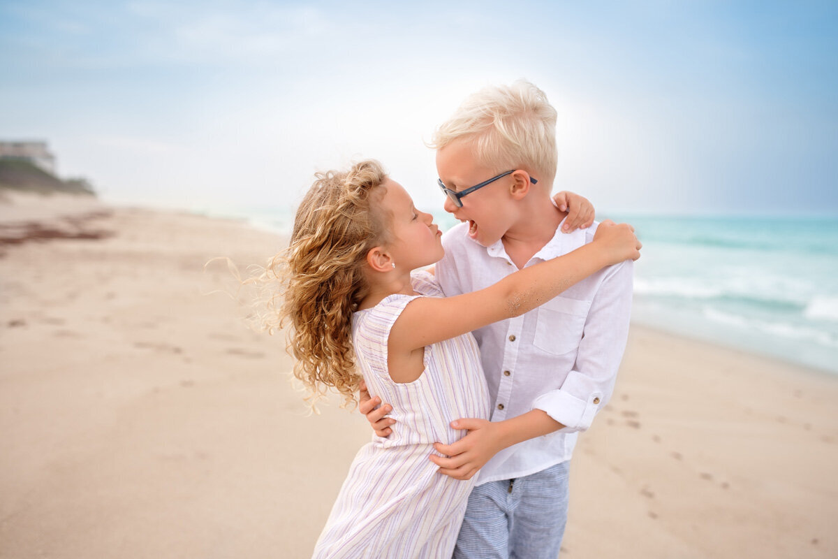 Family session of brother and sister at the beach