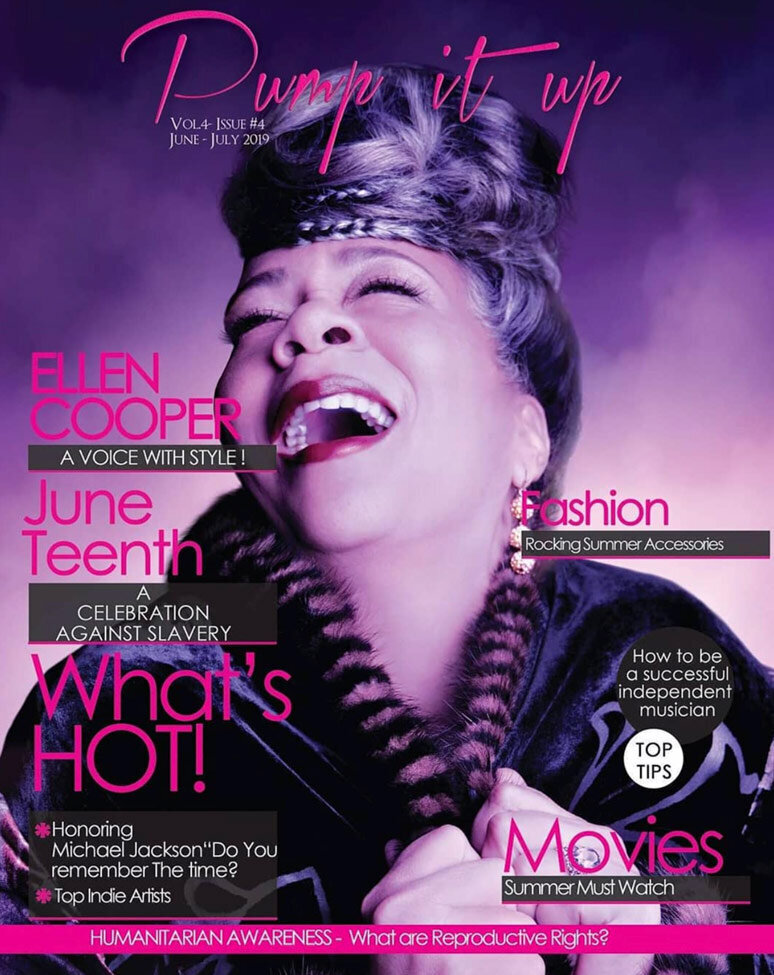 Magazine cover featuring musician Ellen Cooper clasping lapels of coat looking up smiling publication Pump It Up Magazine Los Angeles