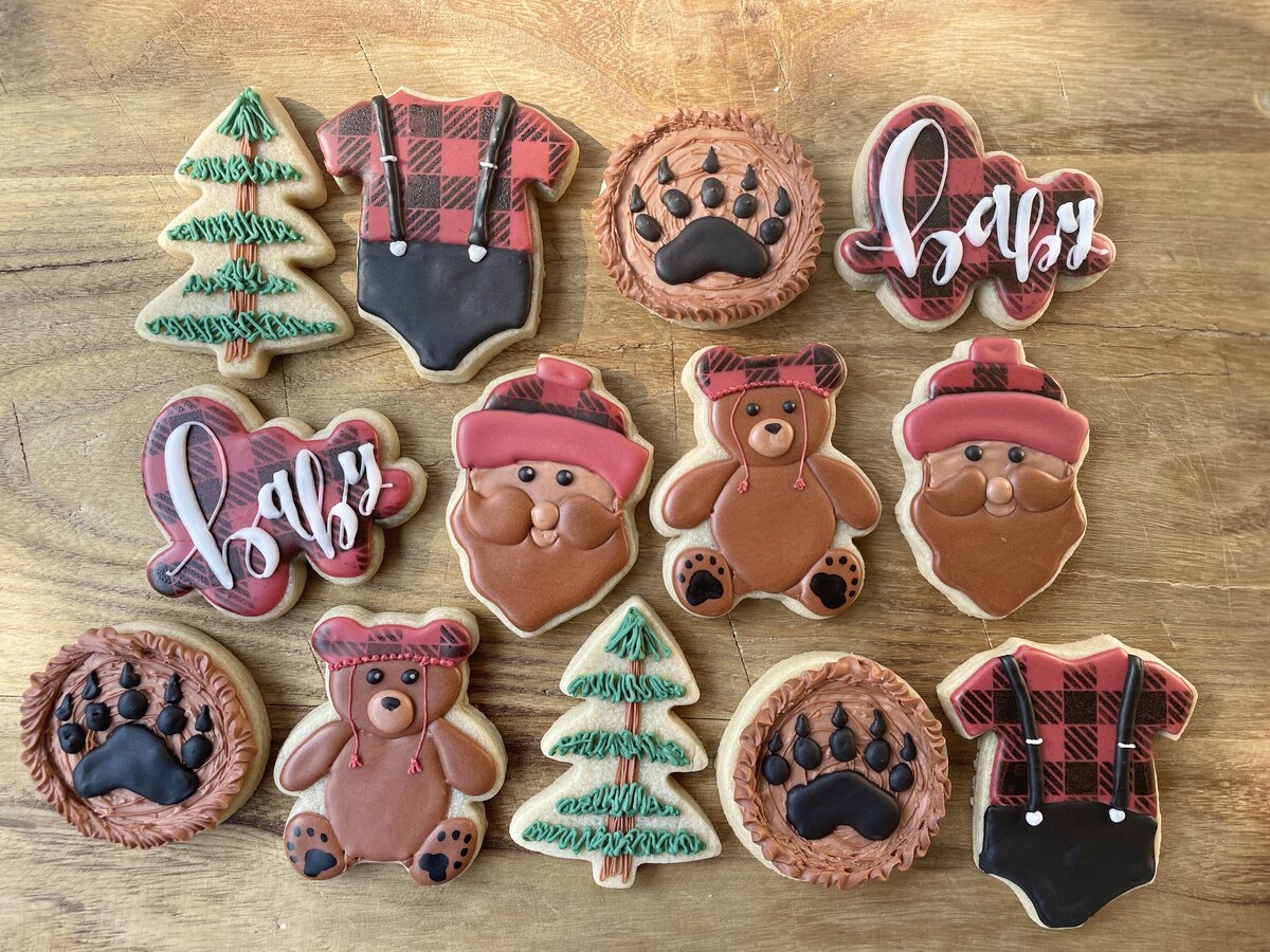 Custom-designed sugar cookies with intricate icing details, perfect for birthdays, made in Gilbert.