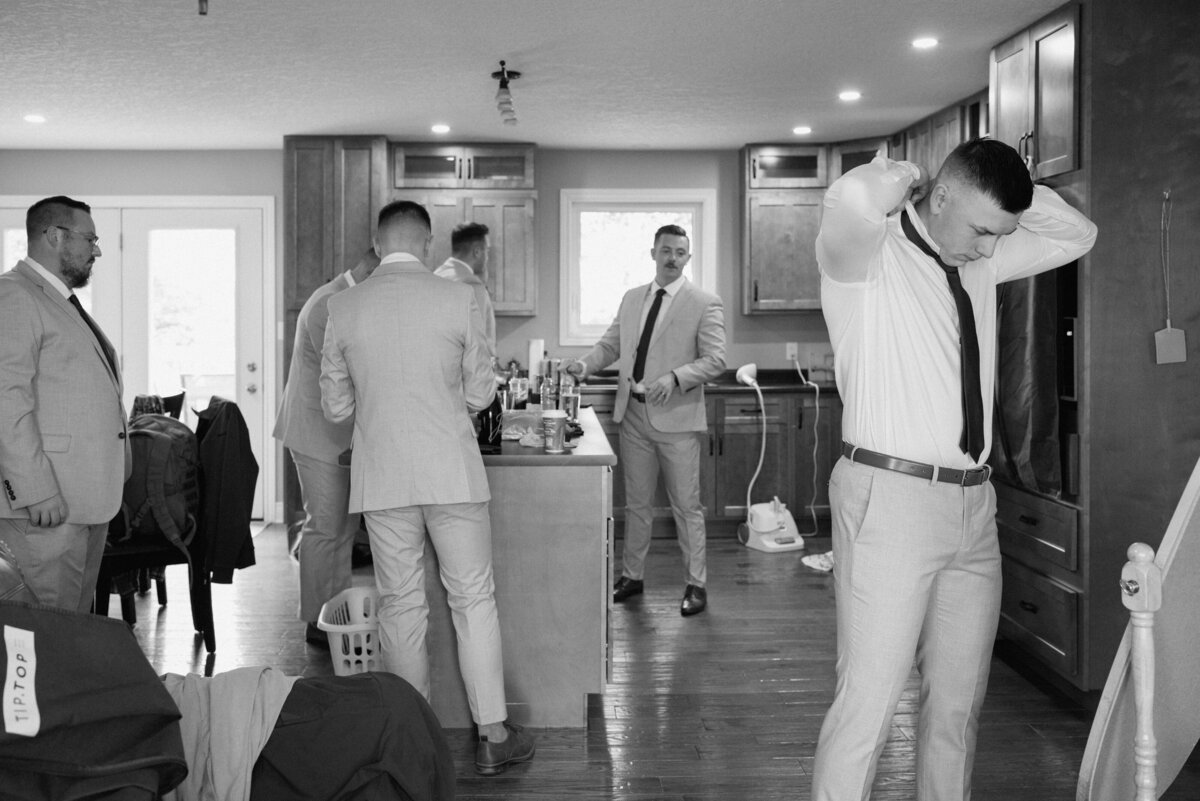 groom getting ready with the guys