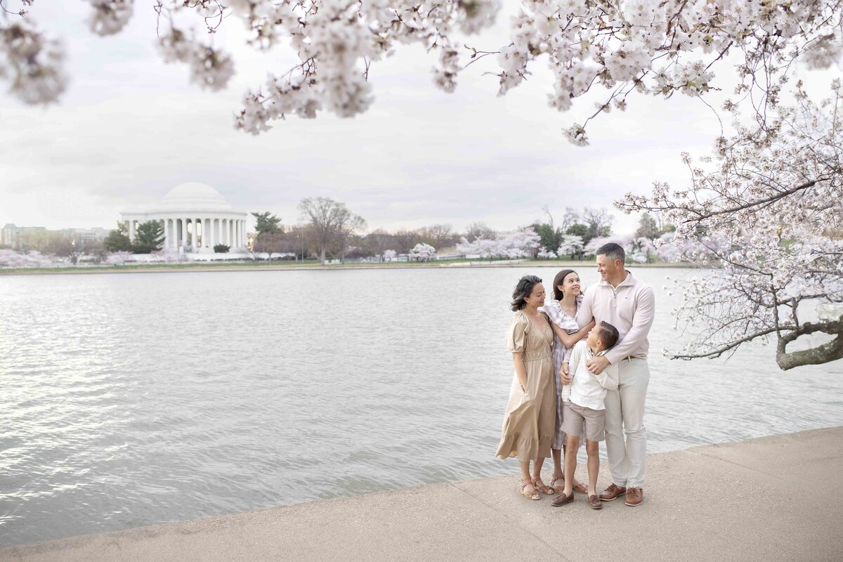 Family session under cherry blossoms