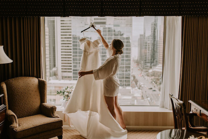 bride hanging dress