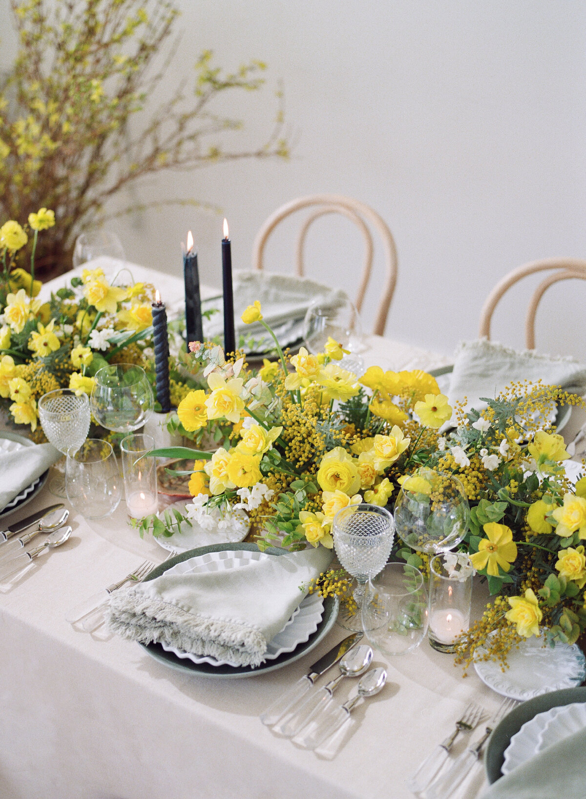 Luxury Wedding Tablescape with yellow florals from Loop Flowers,  slate blue china, linens from BBJ la Tavola and rentals from Theoni