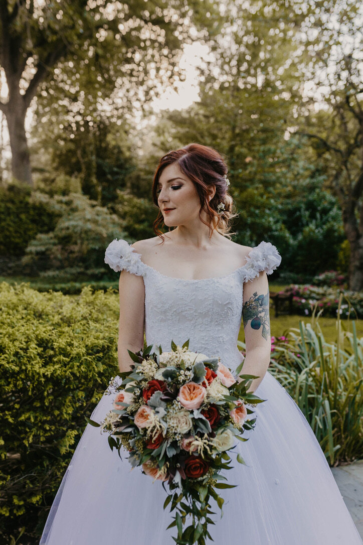 Bride wearing her red hair in a low bun