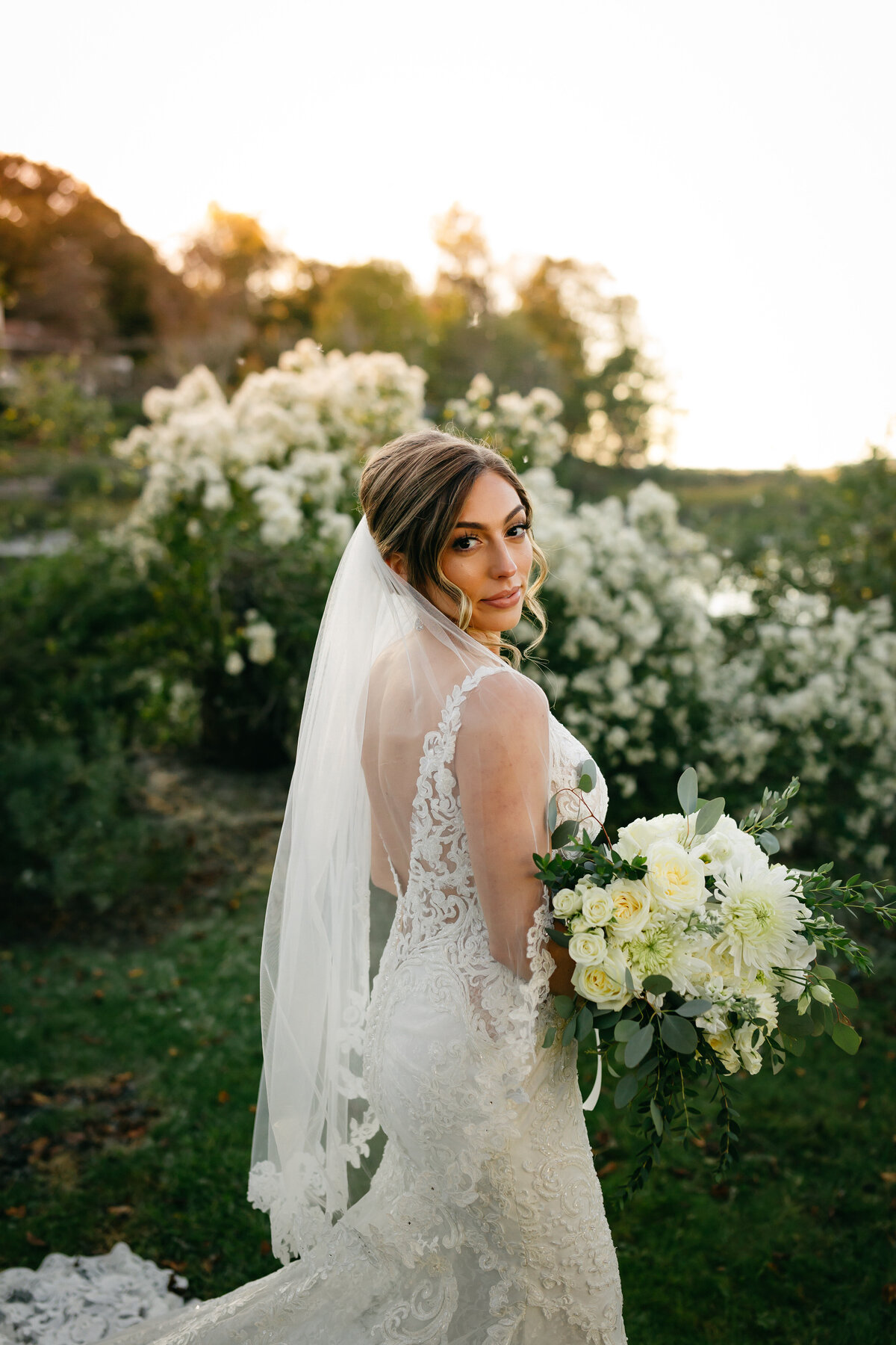Bride portrait with blond hair in a low bun