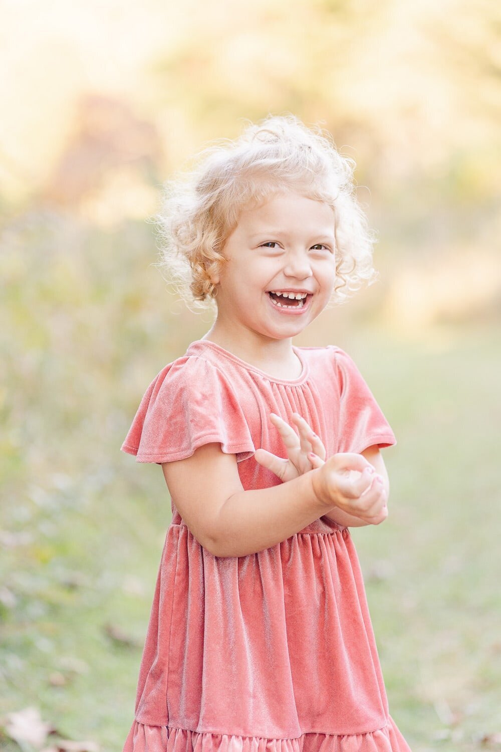 girl laughing taken by a family photographer in Chantilly, Virginia
