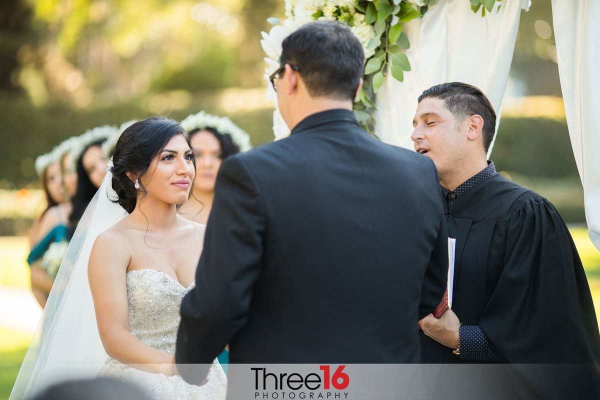 Bride stares at her Groom during the ceremony