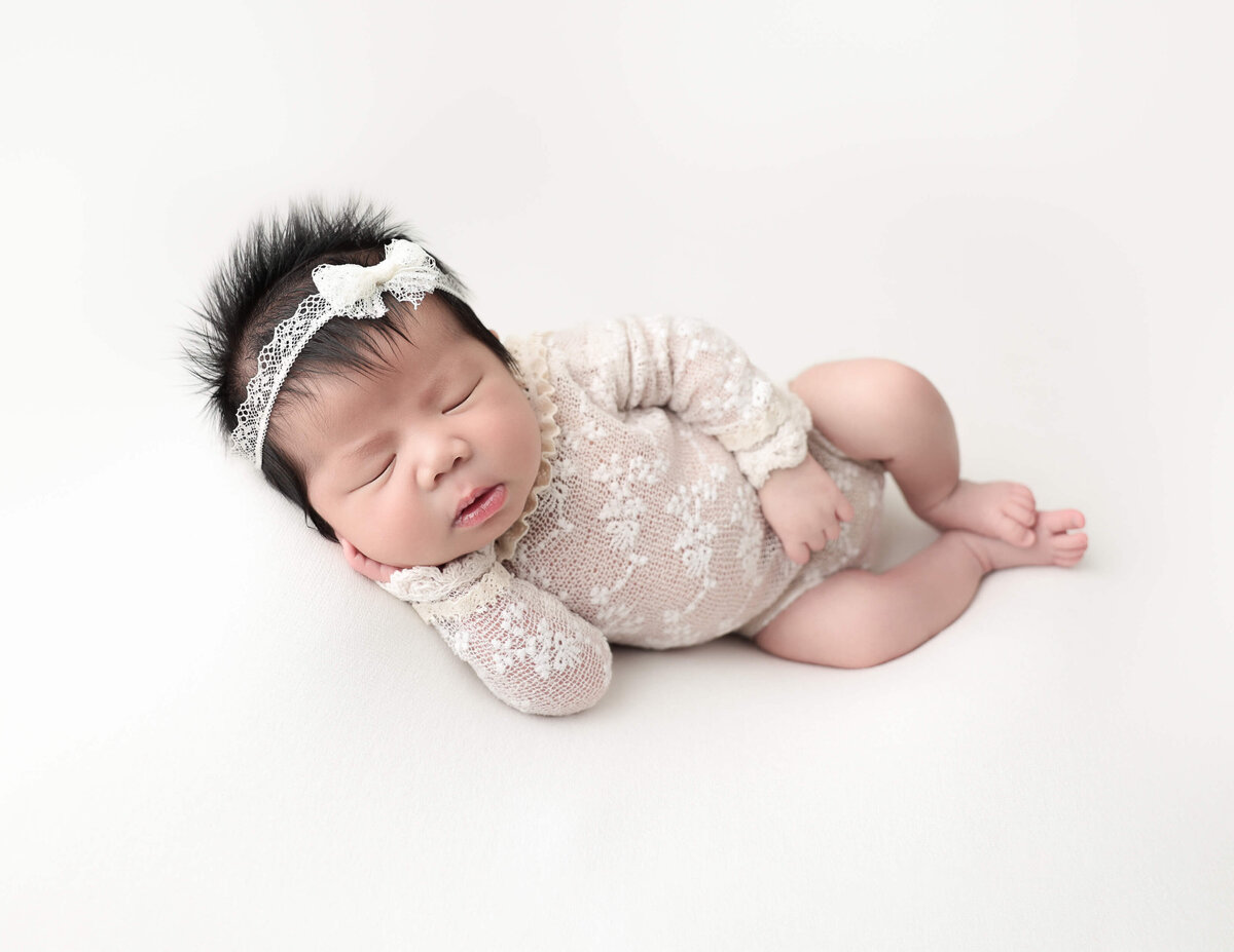 Sweet baby girl posed at our Hilton, Ny studio.