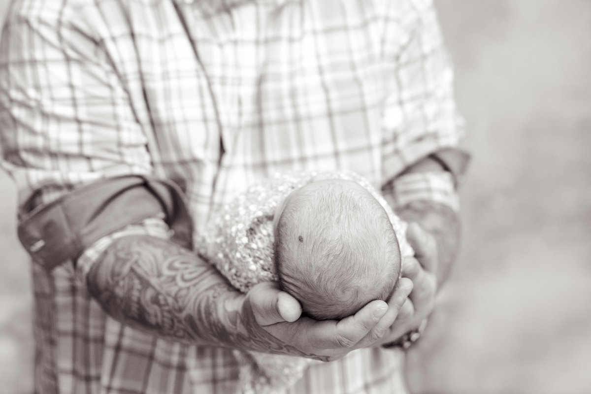 Newborn Baby Photography in Dads Hands