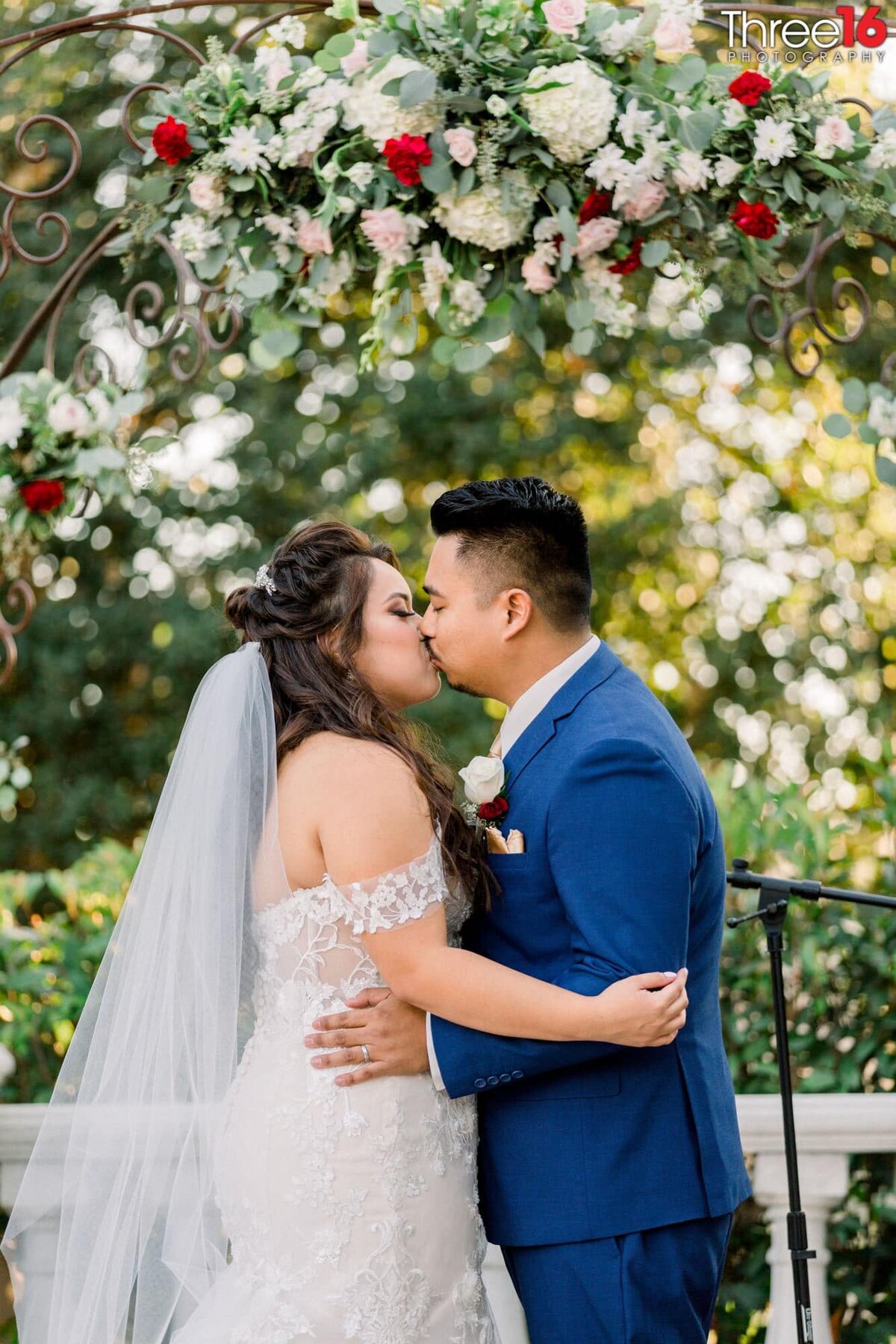 Bride and Groom share their first kiss
