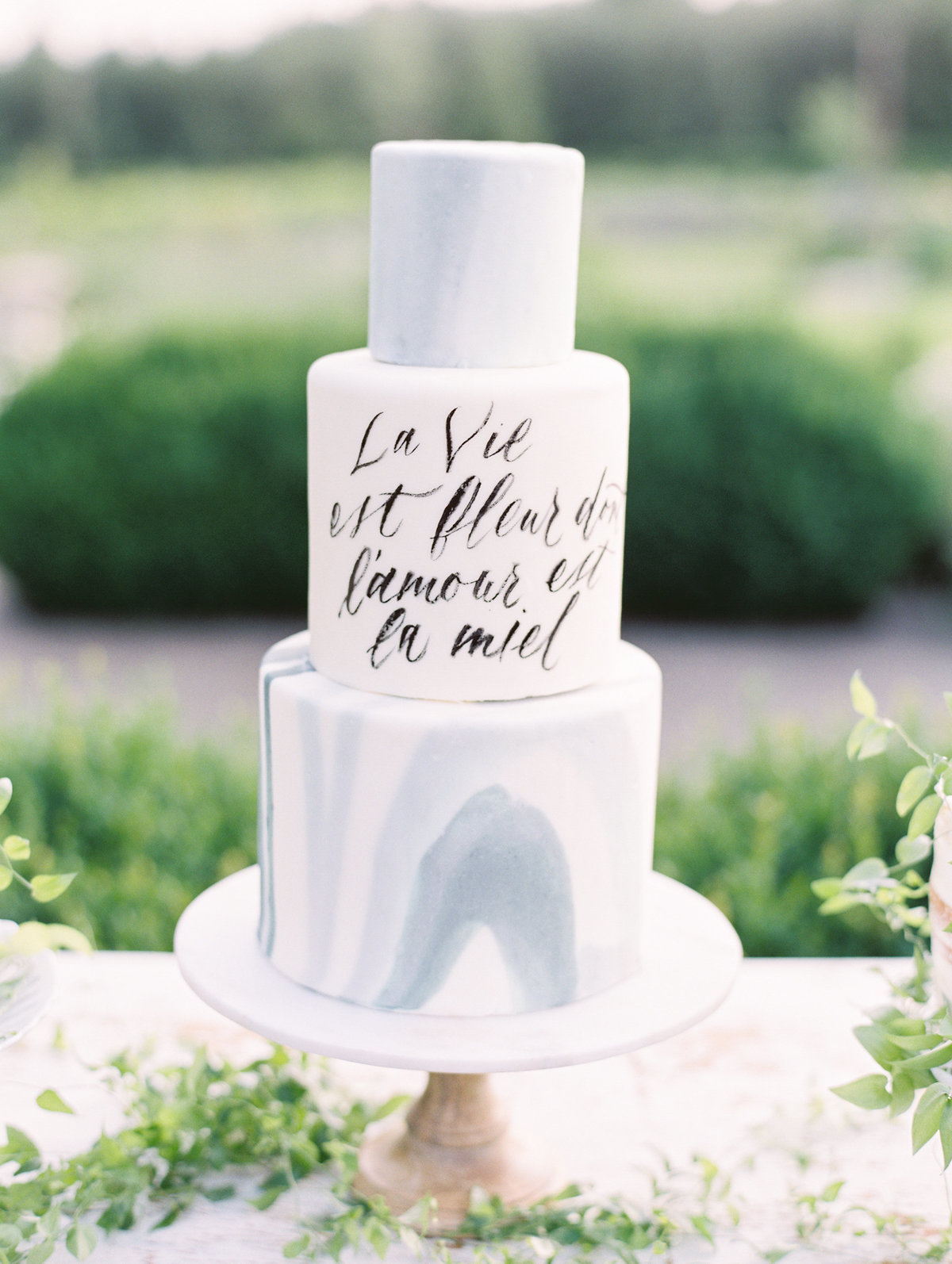 marble wedding cake with custom calligraphy