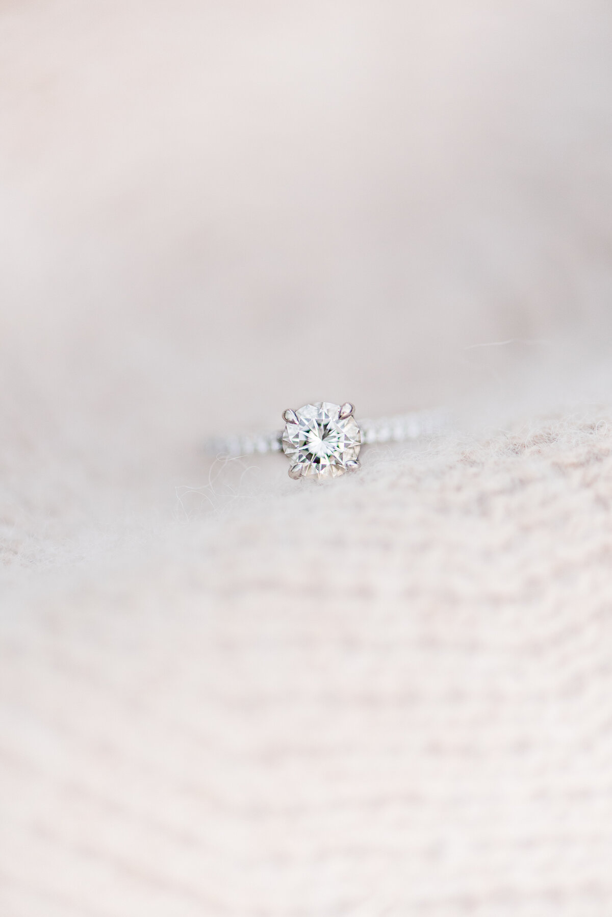 engagement ring on soft fabric