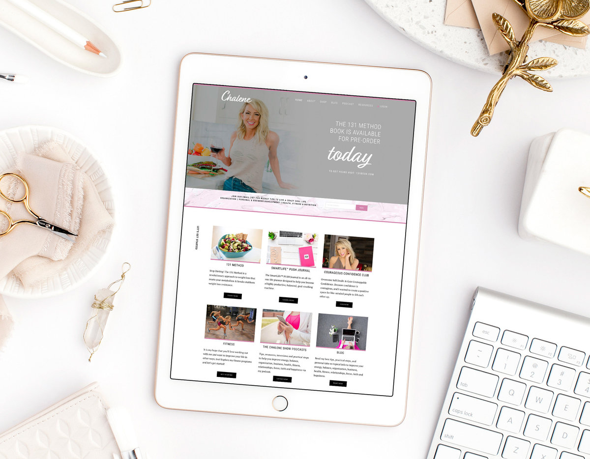 Explore the digital realm with Chalene Johnson's website displayed on an iPad, exemplifying the power of custom web design in creating a standout online presence.
