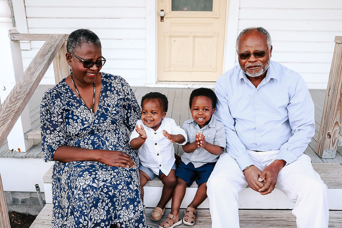 Grandparents and their grandsons on steps