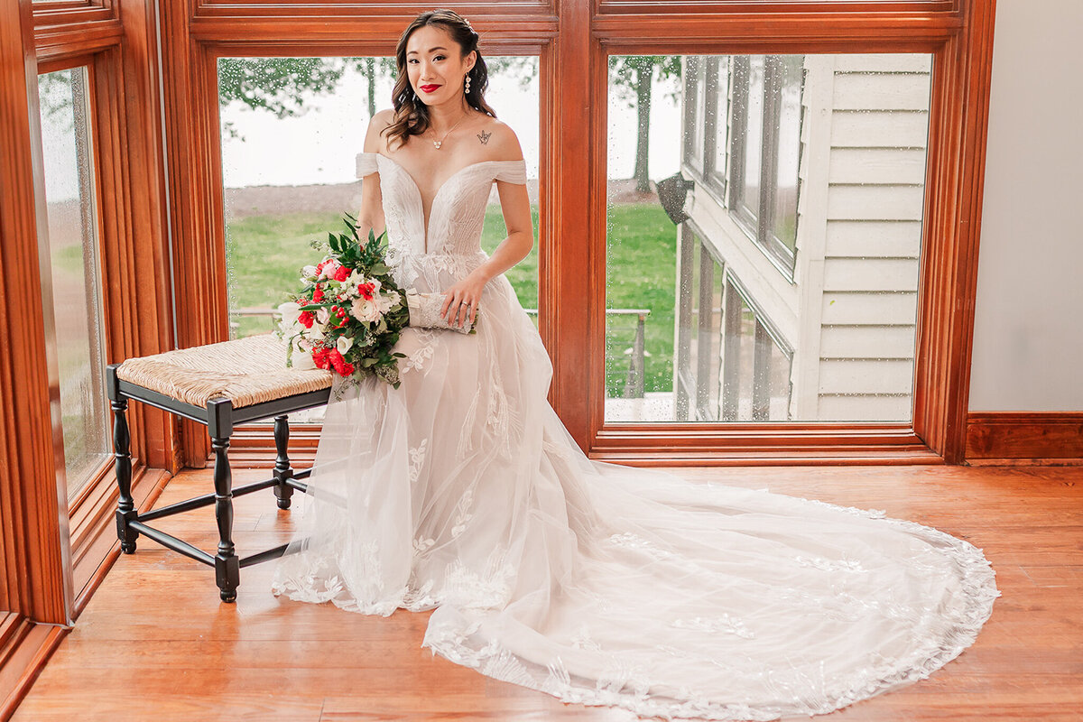 An Asian bride during her Raleigh bridal portrait session on Lake Gaston by JoLynn Photography, a North Carolina wedding photographer