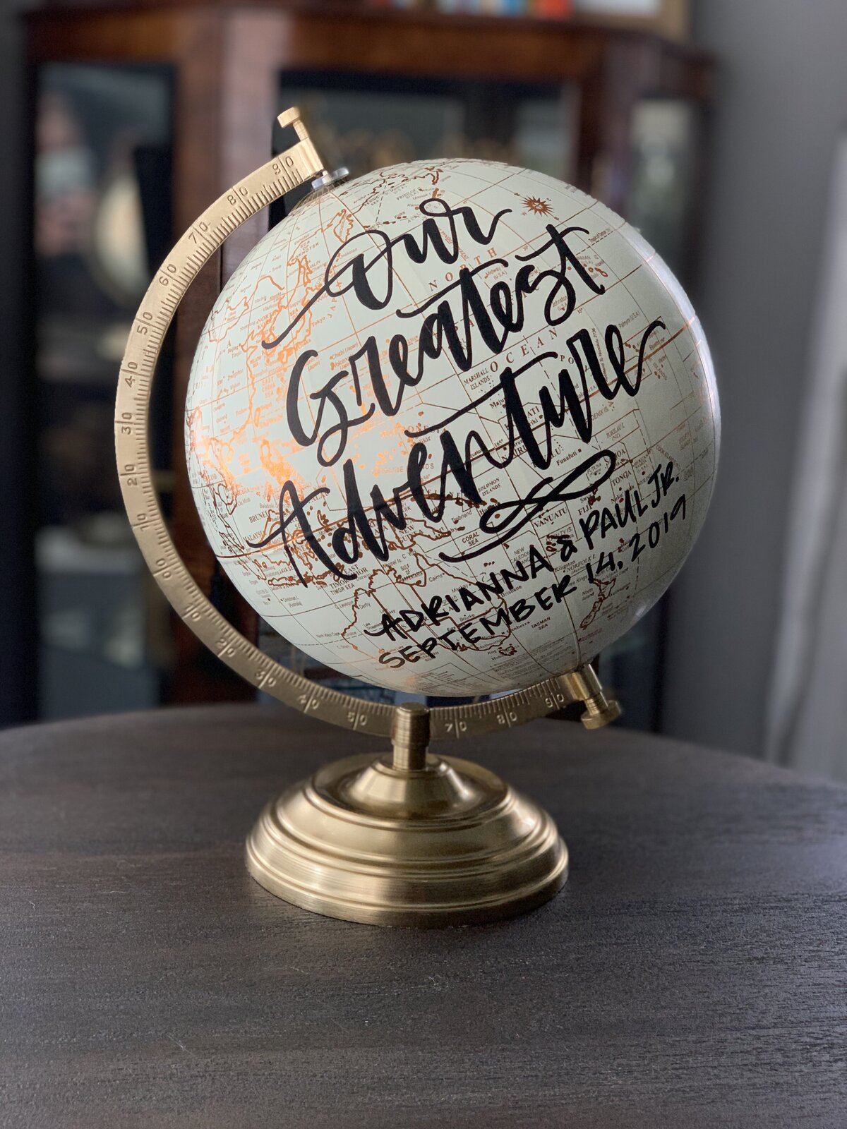 calligraphy globe guestbook sign
