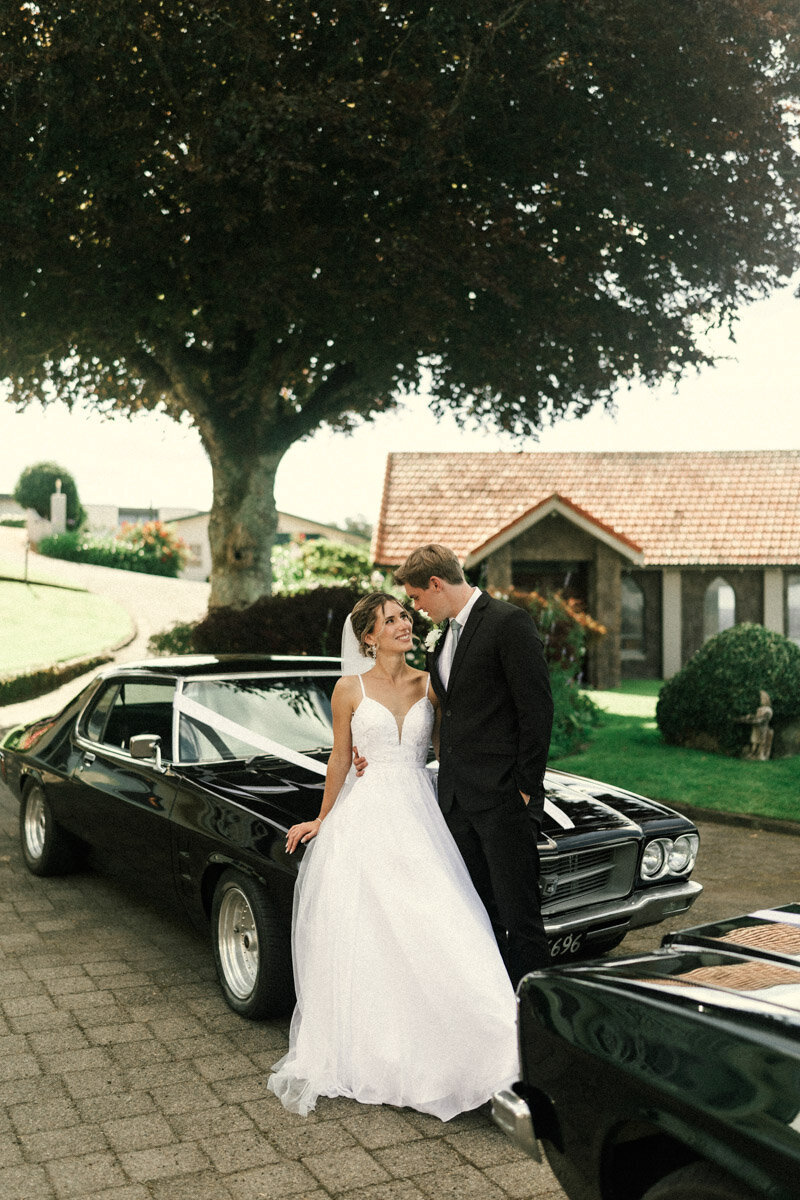 vintage wedding portrait with classic car in bay of plenty by Eilish Burt