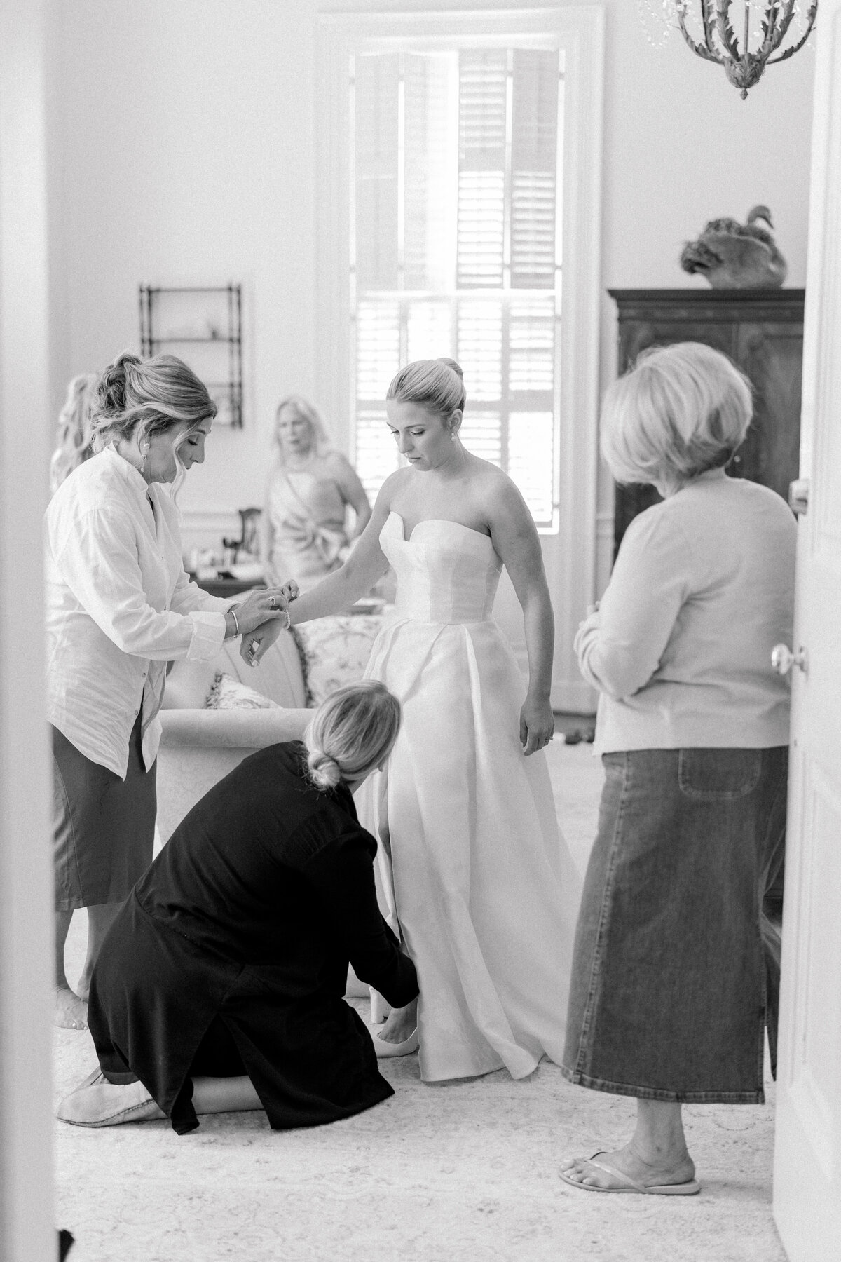 Candid documentary black and white wedding photo.