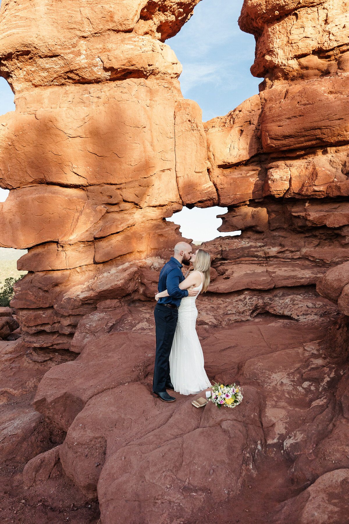 bride and groom intimately saying vows when eloping at garden of the gods colorado