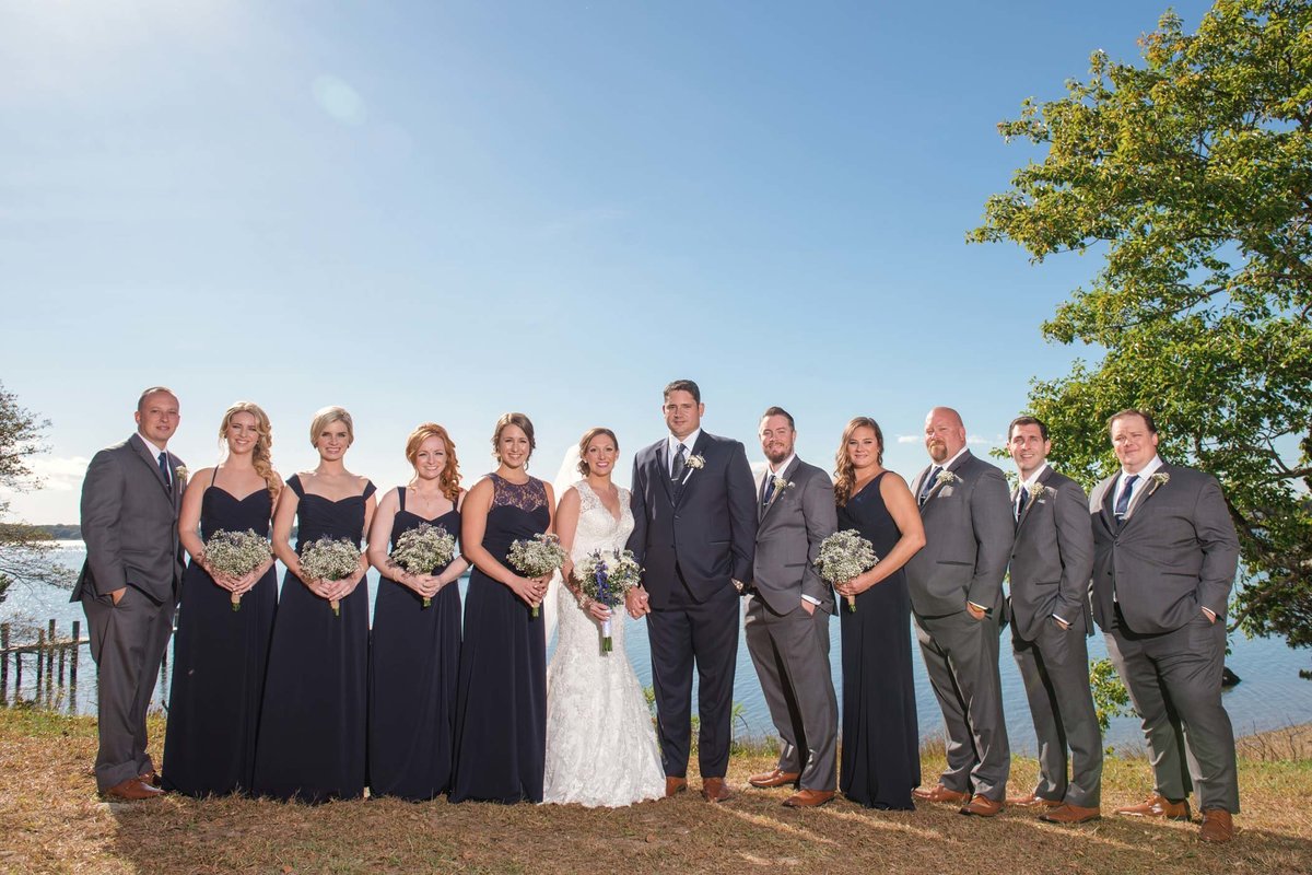 Bridal party by the water at The Ram's Head Inn