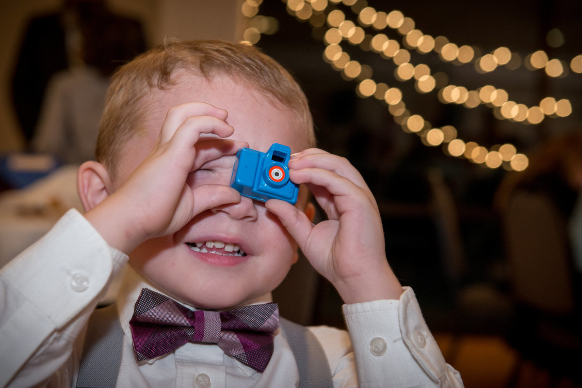 Ring bearer with toy camera